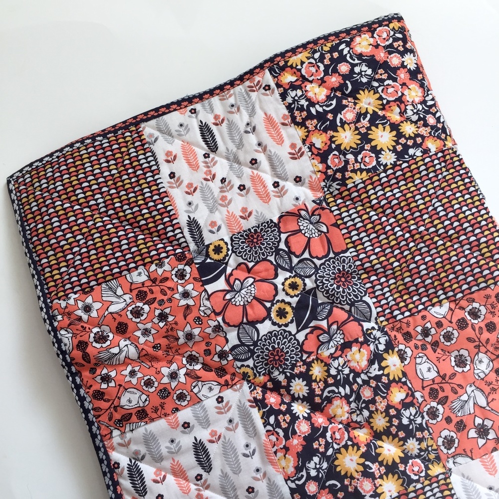 Navy and coral modern boho baby crib / lap quilt